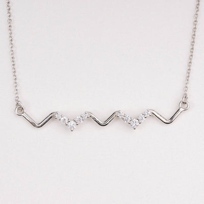 Rhythmic Radiance Heartbeat Necklace